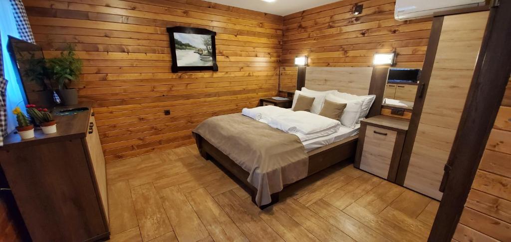 Postel nebo postele na pokoji v ubytování Cuki Residence