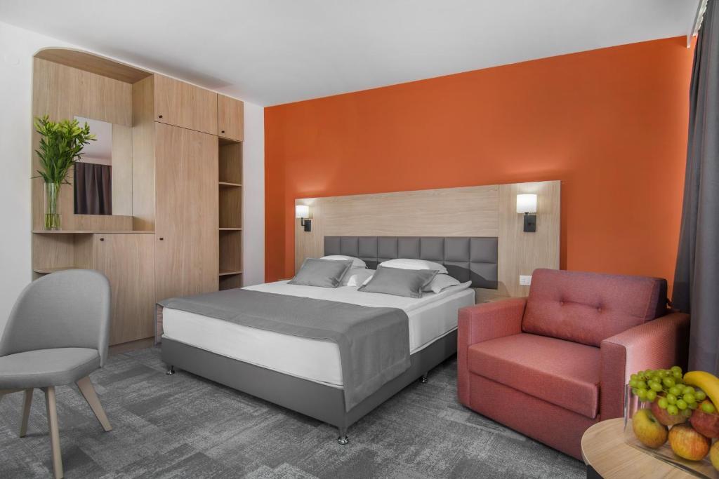 Postel nebo postele na pokoji v ubytování Hotel Split Inn by President