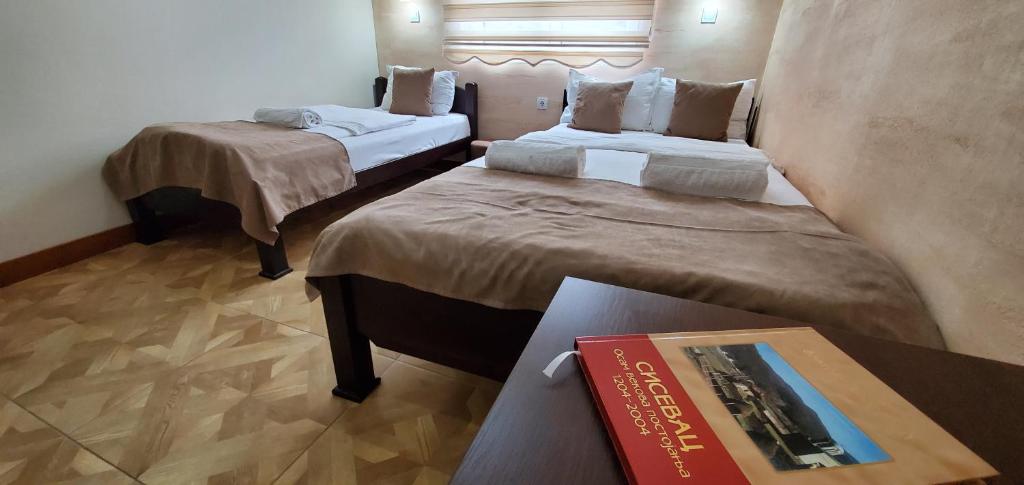 Postel nebo postele na pokoji v ubytování Cuki Residence