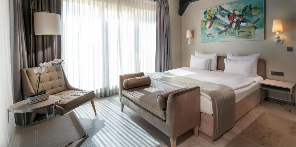 A bed or beds in a room at The Gate Ataşehir Finance Centre