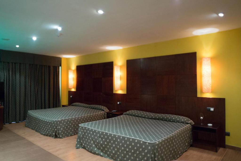 Posteľ alebo postele v izbe v ubytovaní Motel Emporio