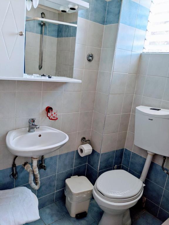 Koupelna v ubytování Hotel Ionio