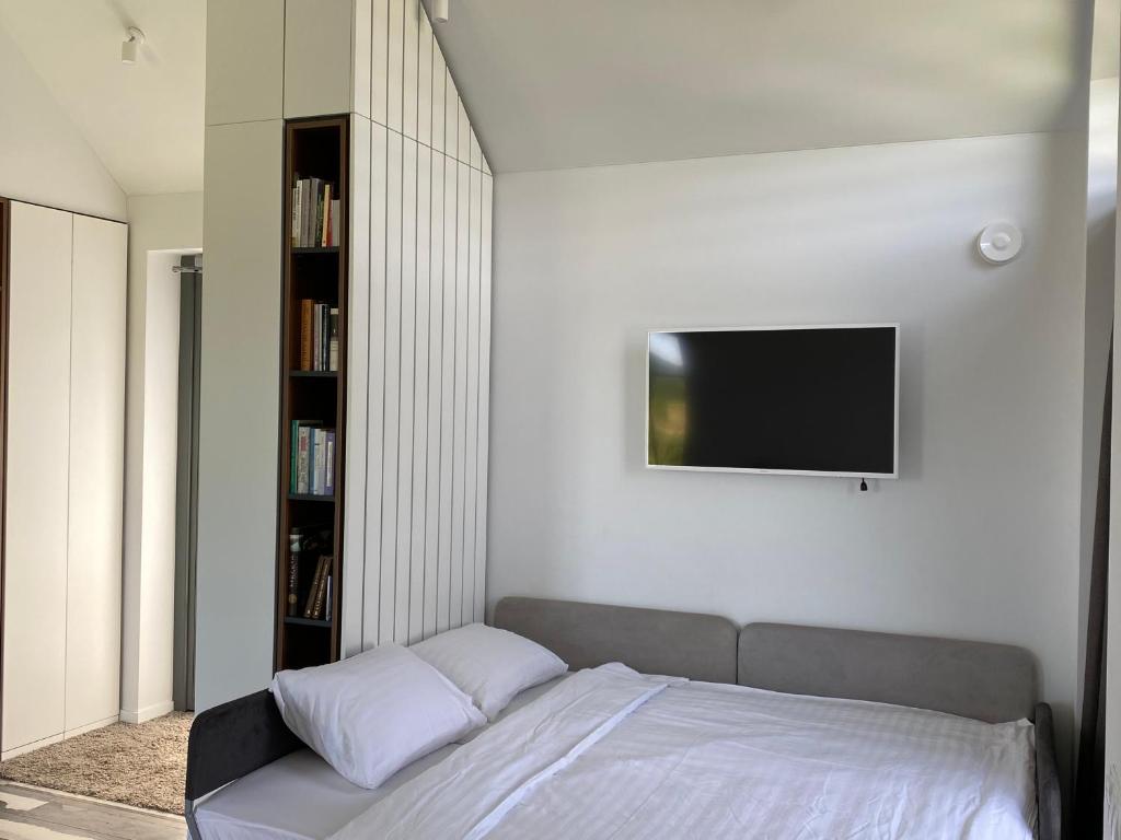 Postel nebo postele na pokoji v ubytování Utriai Guest Place