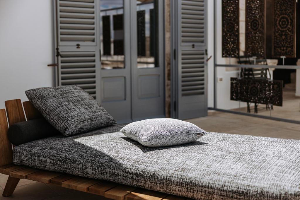 Кровать или кровати в номере Paragon 700 Boutique Hotel & SPA