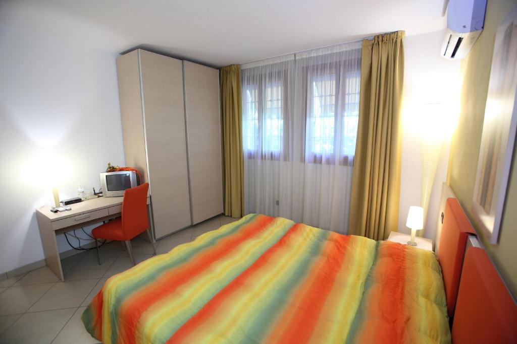 Postel nebo postele na pokoji v ubytování B&B Ca' Loi