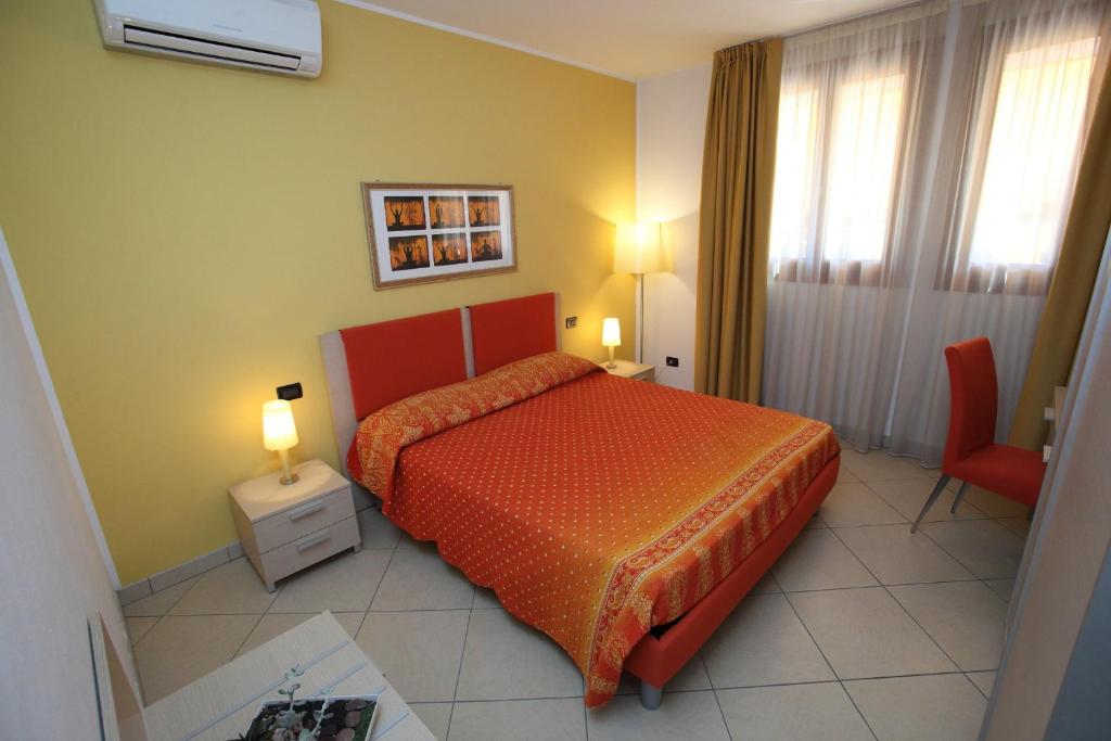 Postel nebo postele na pokoji v ubytování B&B Ca' Loi
