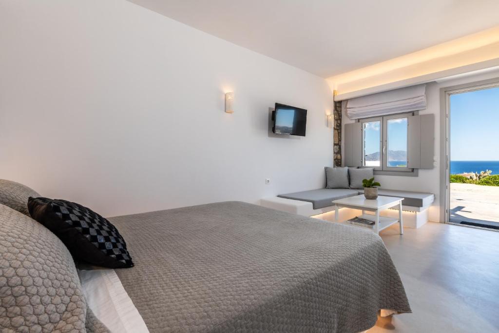 Televízia a/alebo spoločenská miestnosť v ubytovaní Aegean View Apartments Mykonos