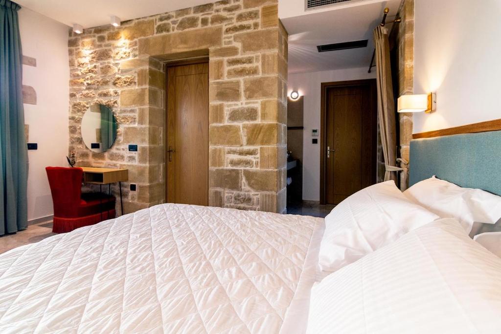 Postel nebo postele na pokoji v ubytování Anma Villa