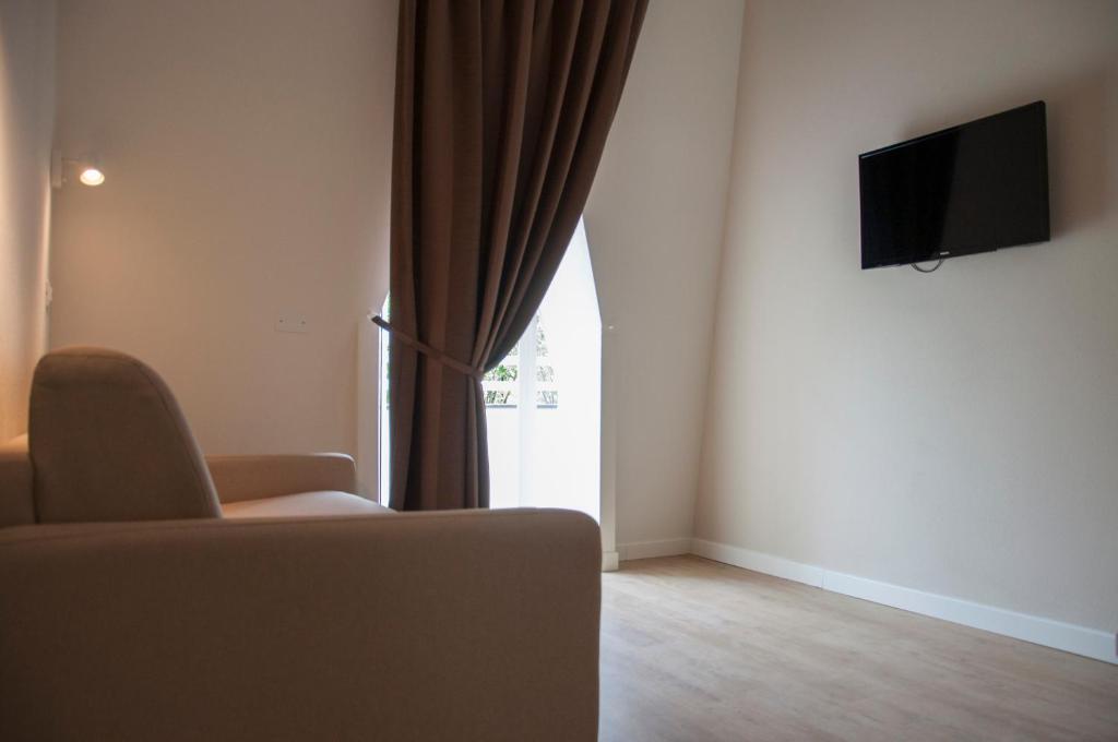 TV a/nebo společenská místnost v ubytování Hotel Ondina e Milazzo