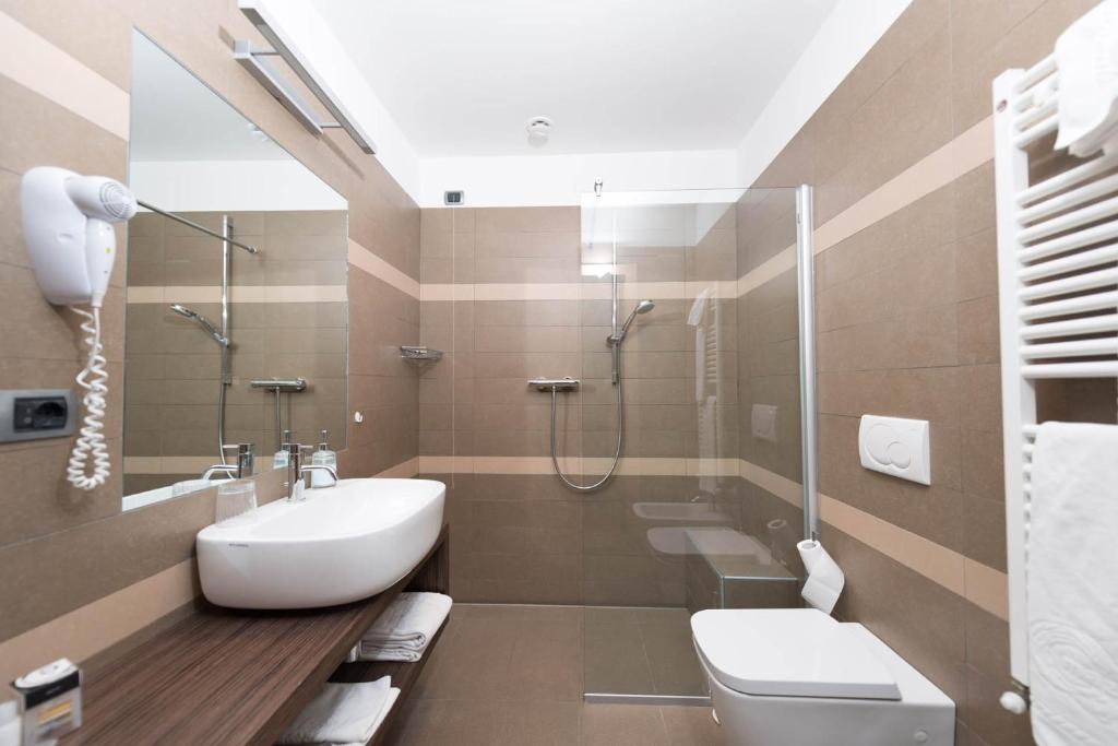 Koupelna v ubytování Hotel Baia Verde
