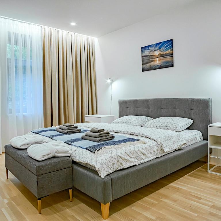 Postel nebo postele na pokoji v ubytování Comfy Rest apartments in Juodkrantė
