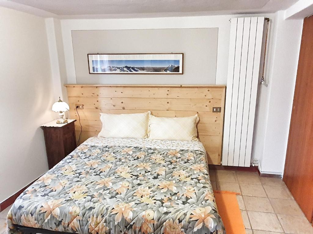 Postel nebo postele na pokoji v ubytování B&B Il Pettirosso