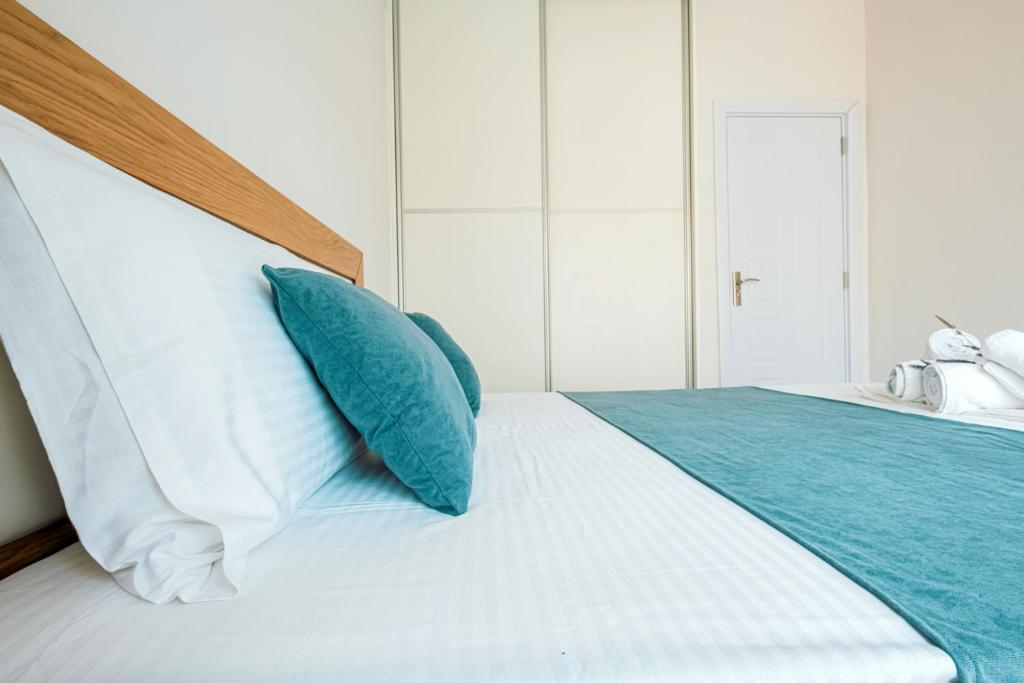 Posteľ alebo postele v izbe v ubytovaní Design Suites Efharis (Brusco)