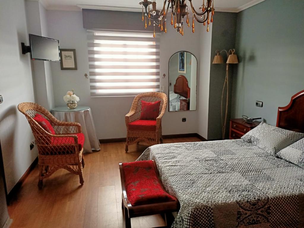 Postel nebo postele na pokoji v ubytování O Seixo 1