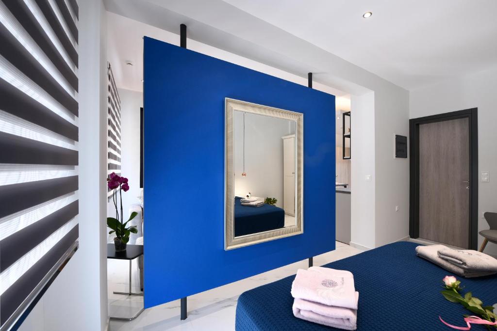 Postel nebo postele na pokoji v ubytování Adell Deluxe Apartments