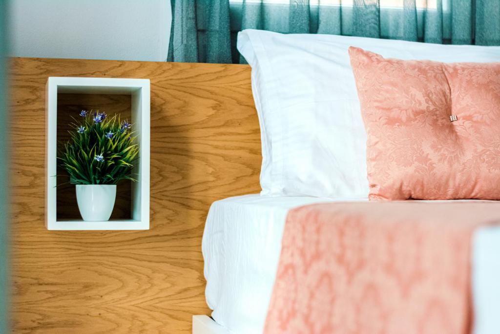 Posteľ alebo postele v izbe v ubytovaní Design Suites Efharis (Brusco)