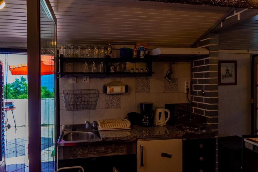 Kuchyň nebo kuchyňský kout v ubytování Apartment Gea 2