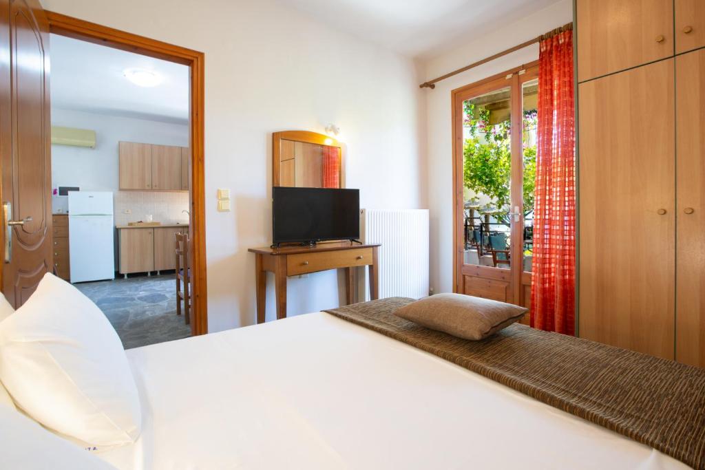 Postel nebo postele na pokoji v ubytování Giapis apartment