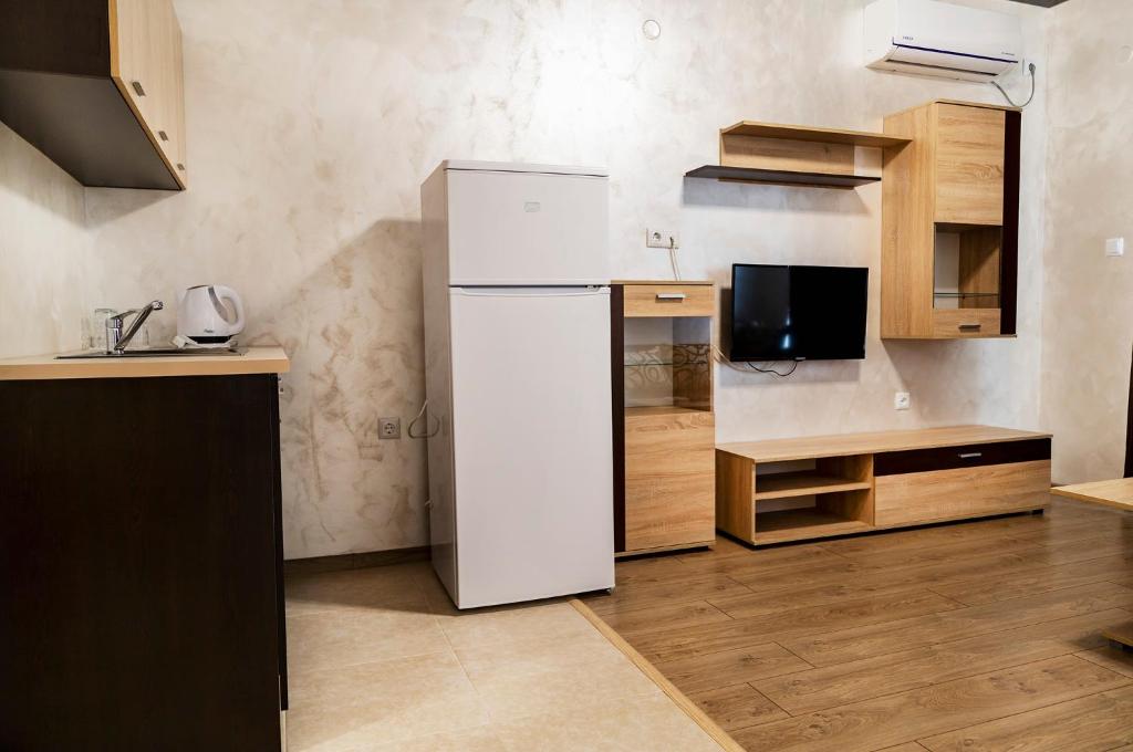 Kuchyň nebo kuchyňský kout v ubytování family hotel - City hotel yambol