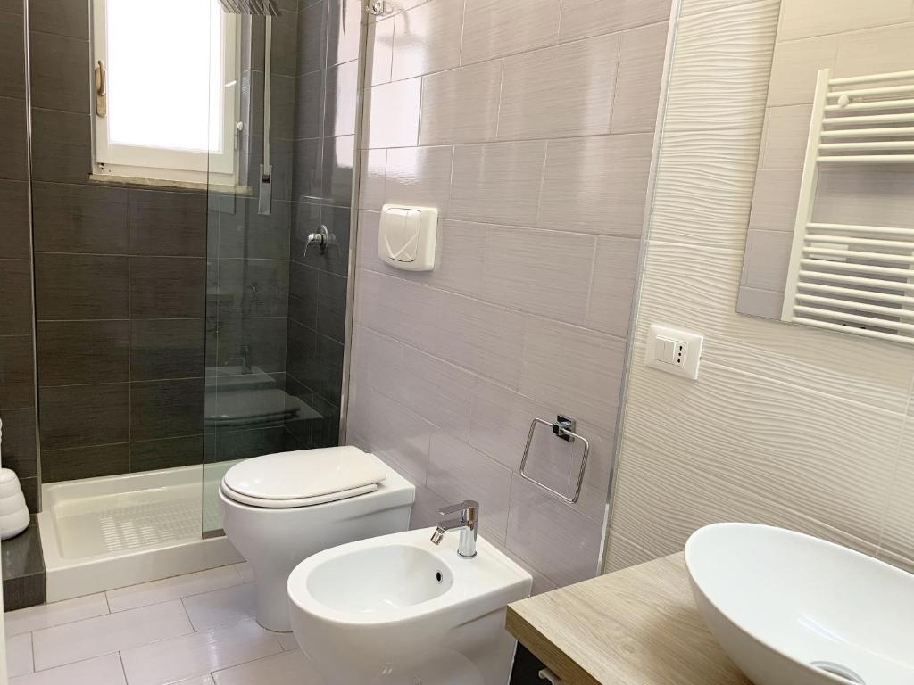 Koupelna v ubytování L'Attico di Piazza Mazzini Rooms