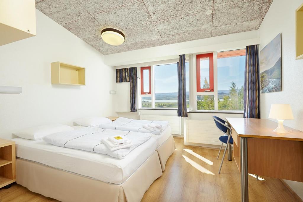 Llit o llits en una habitació de Hotel Edda Egilsstadir