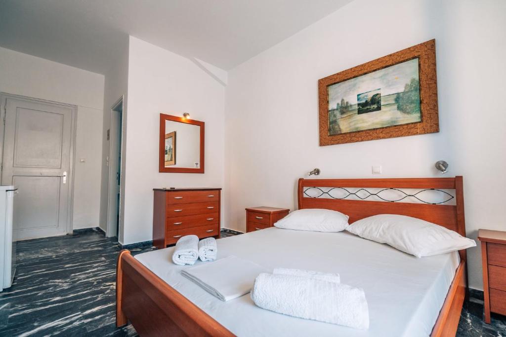 Voodi või voodid majutusasutuse Meropi Rooms toas