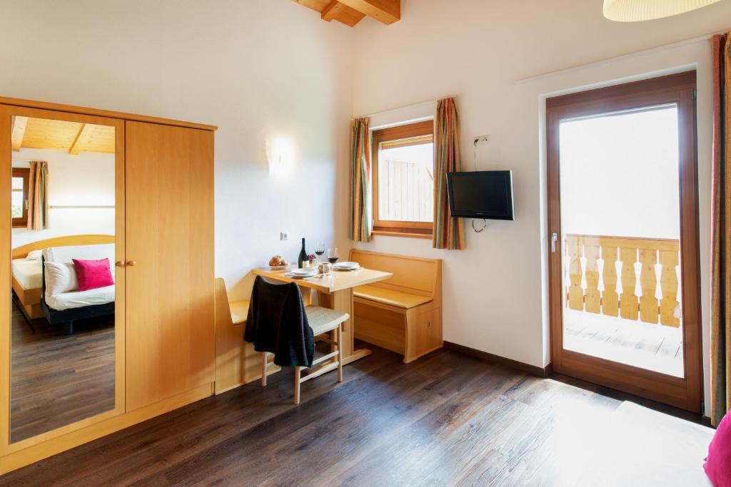 TV a/nebo společenská místnost v ubytování B & B Apartments Ortlerblick