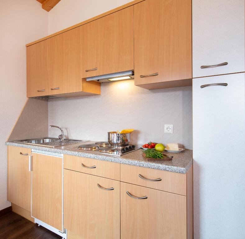 Kuchyň nebo kuchyňský kout v ubytování B & B Apartments Ortlerblick