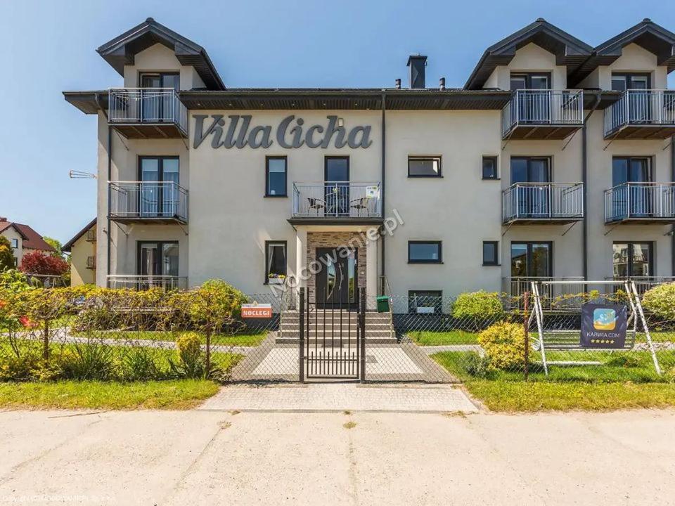 a building with a sign that reads villa cecilia at Villa Cicha in Karwia