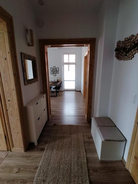 Televízia a/alebo spoločenská miestnosť v ubytovaní Apartament KurOrt Gaja