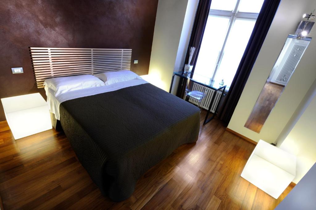 Postel nebo postele na pokoji v ubytování B&B Terres D'Aventure Suites
