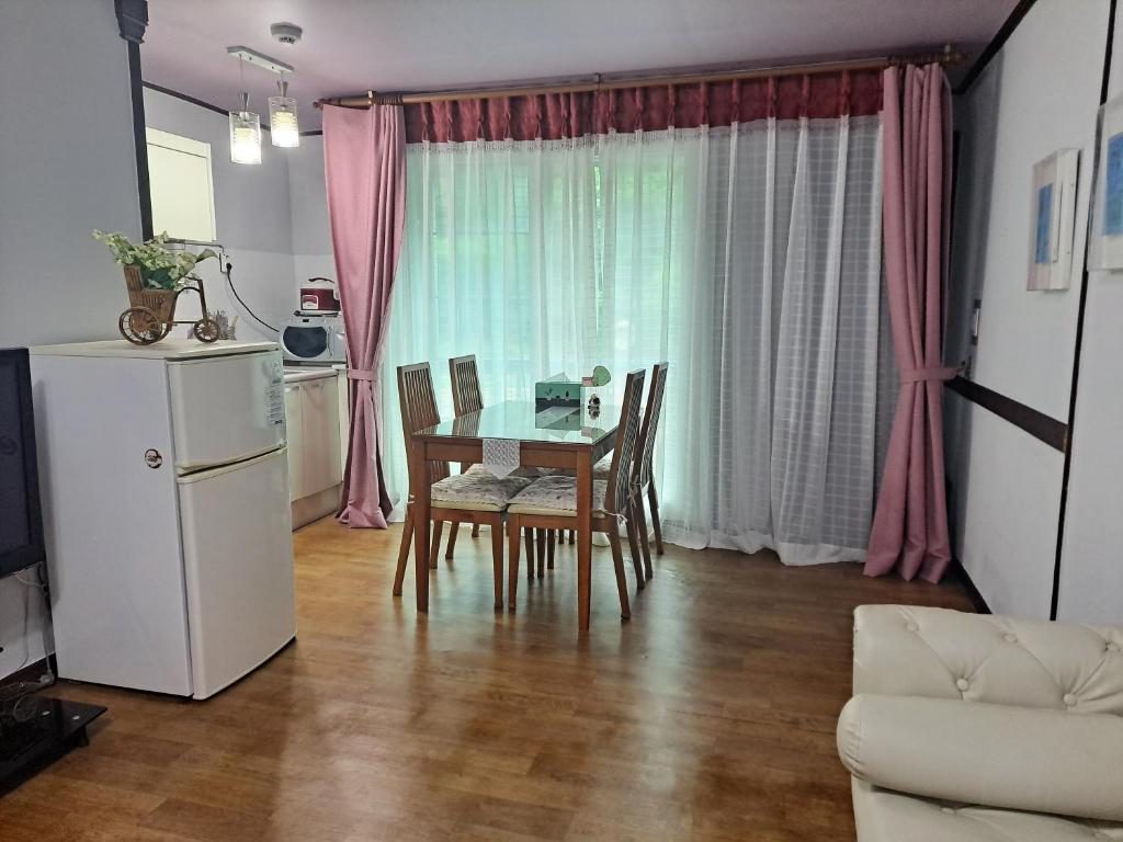Kuchyň nebo kuchyňský kout v ubytování Charm Pension
