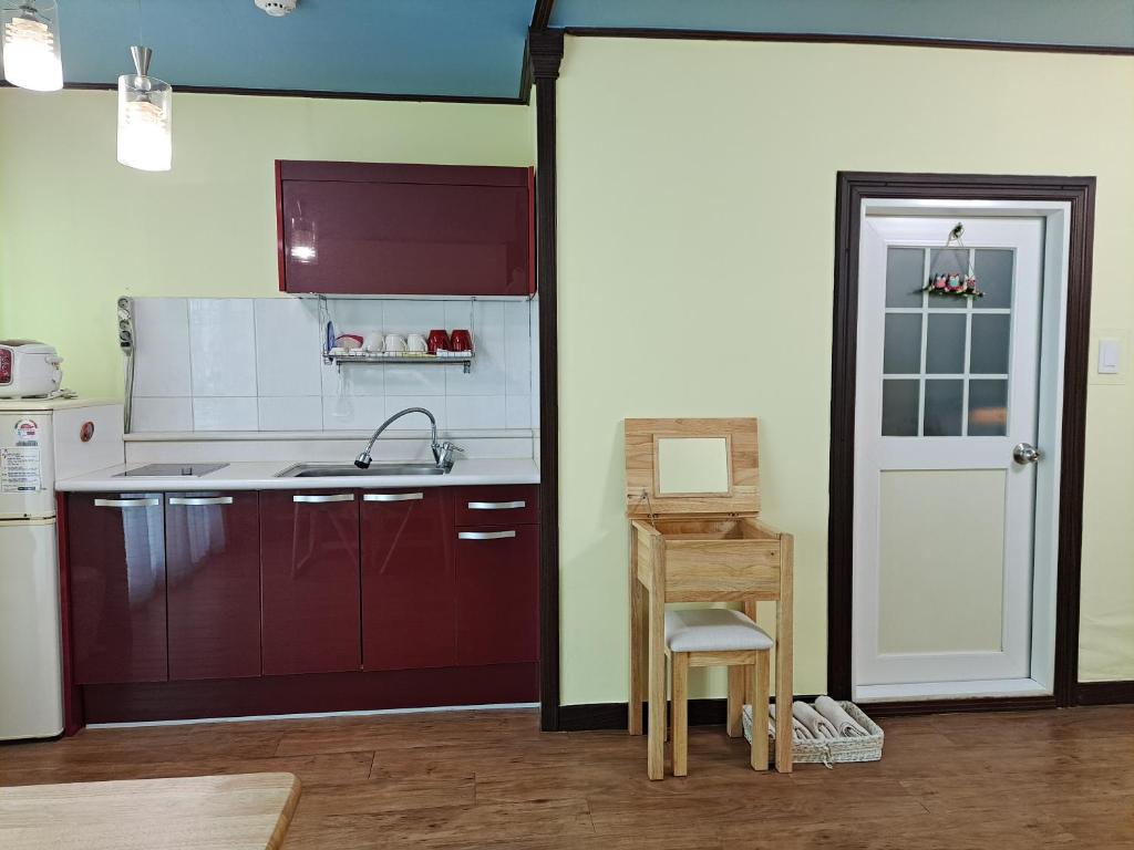 Kuchyň nebo kuchyňský kout v ubytování Charm Pension