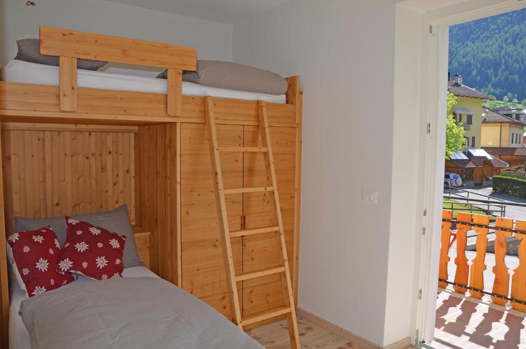 Posteľ alebo postele v izbe v ubytovaní Casa vacanze Heidi e Peter Val di Rabbi