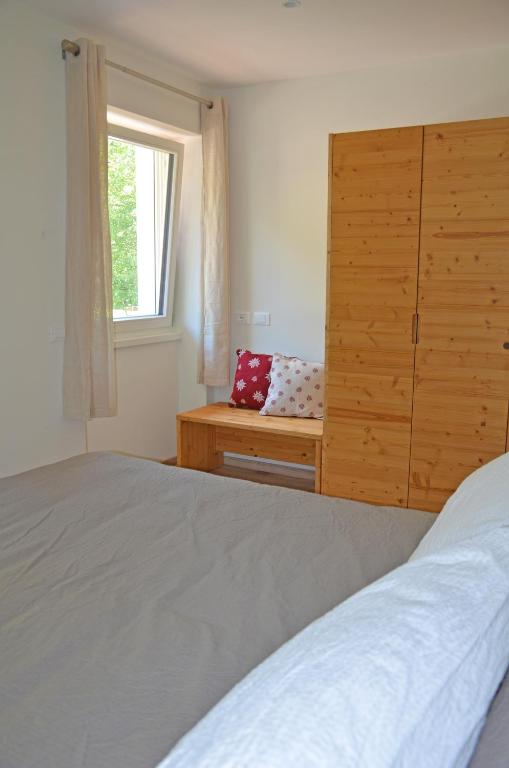 Posteľ alebo postele v izbe v ubytovaní Casa vacanze Heidi e Peter Val di Rabbi