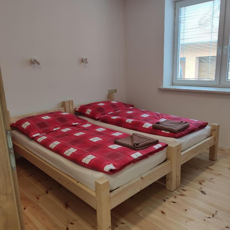 Postel nebo postele na pokoji v ubytování Apartmán Špacír