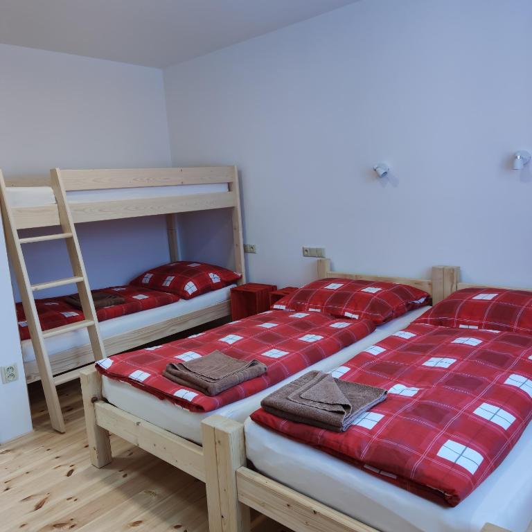 Postel nebo postele na pokoji v ubytování Apartmán Špacír