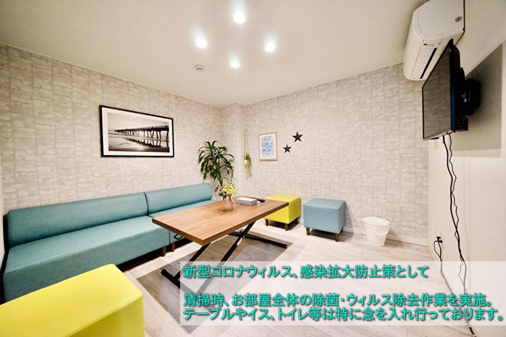 Guest House Re-worth Joshin1 2Fにあるテレビまたはエンターテインメントセンター