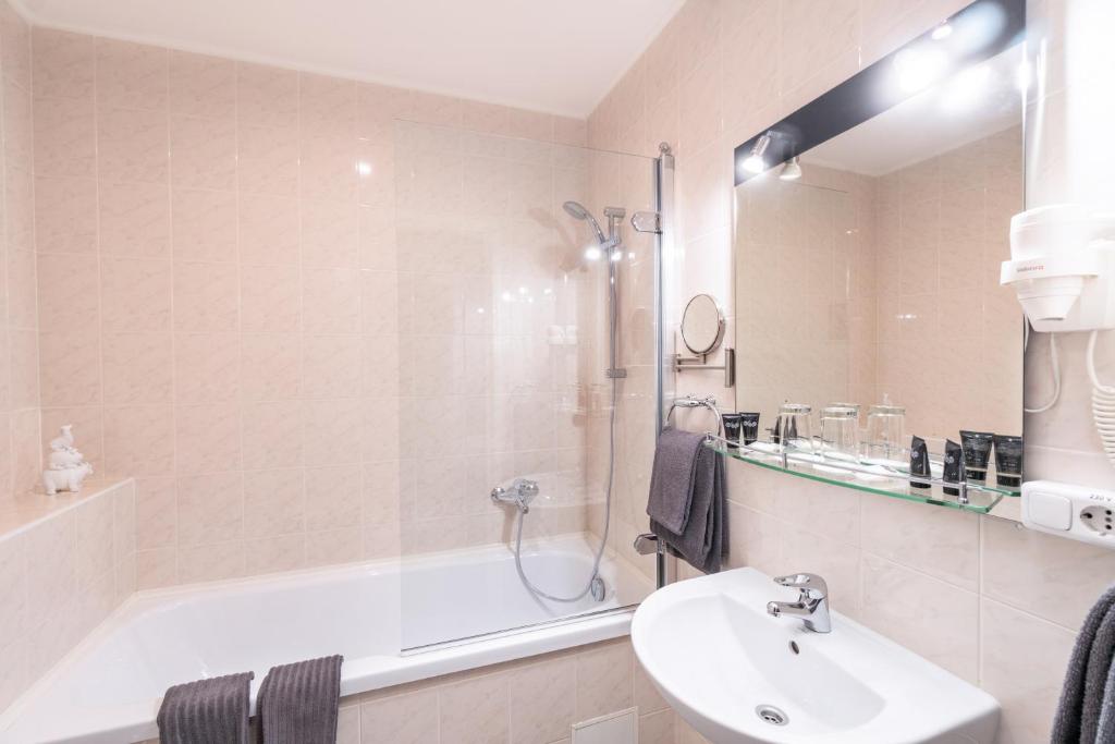 Koupelna v ubytování Forums Boutique Hotel