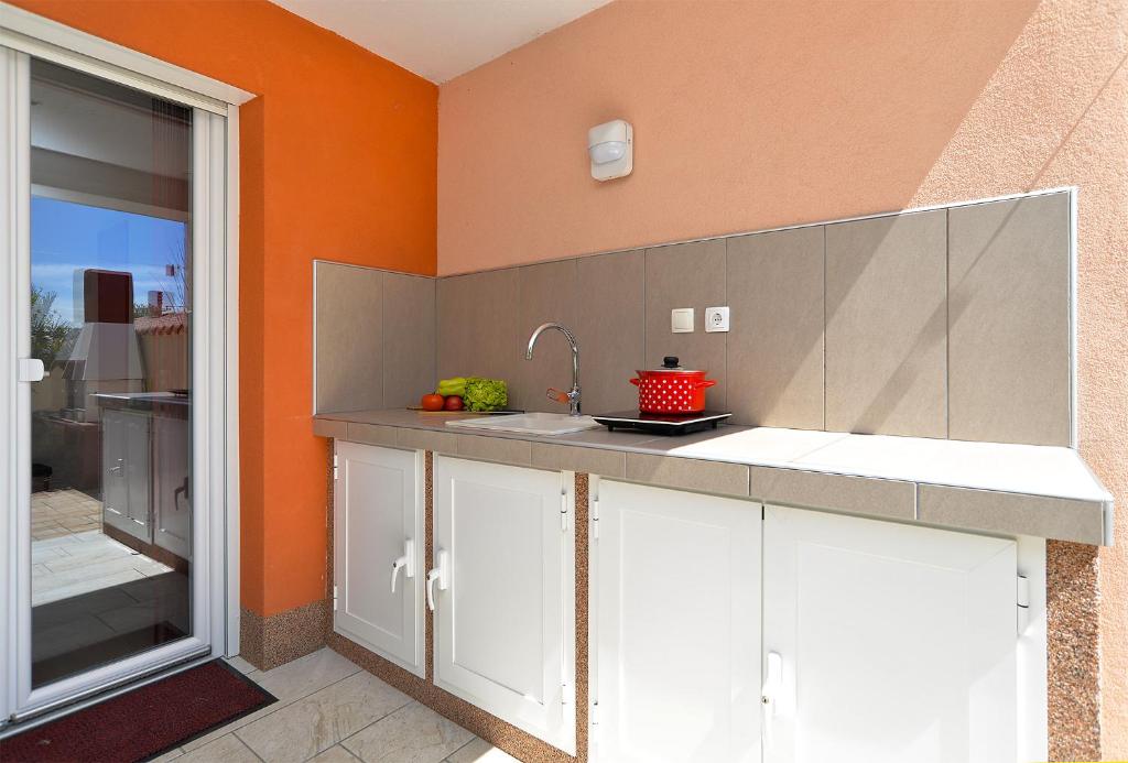 Kuchyň nebo kuchyňský kout v ubytování House Betiga 1771