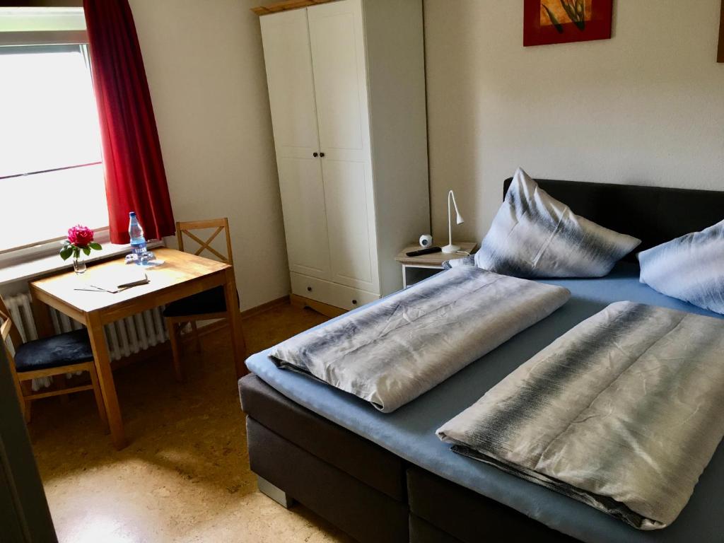 Postel nebo postele na pokoji v ubytování Mertens