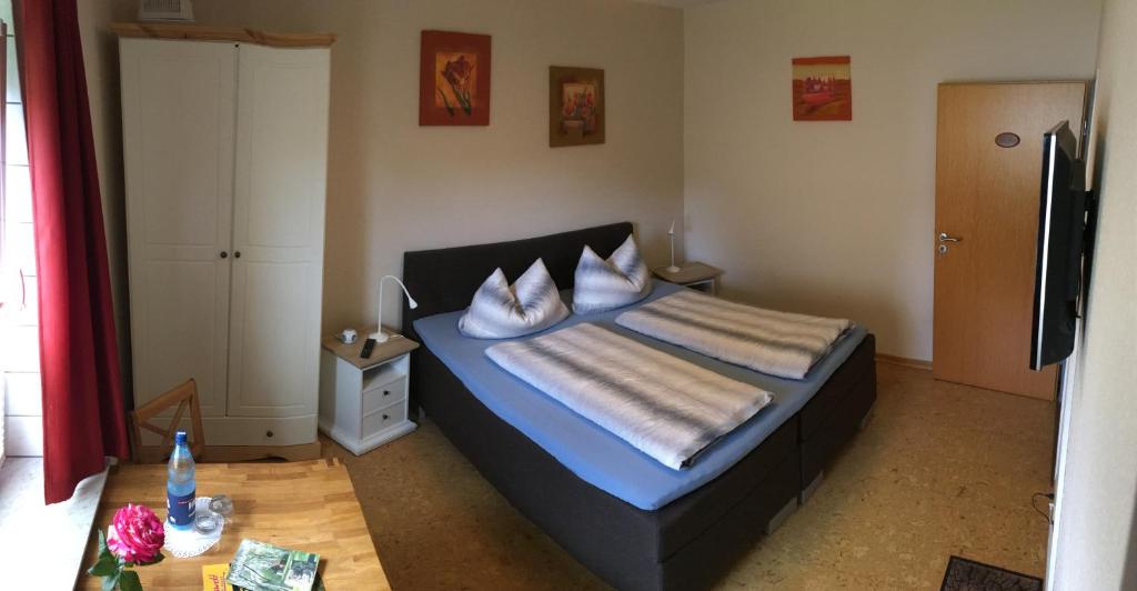 Postel nebo postele na pokoji v ubytování Mertens