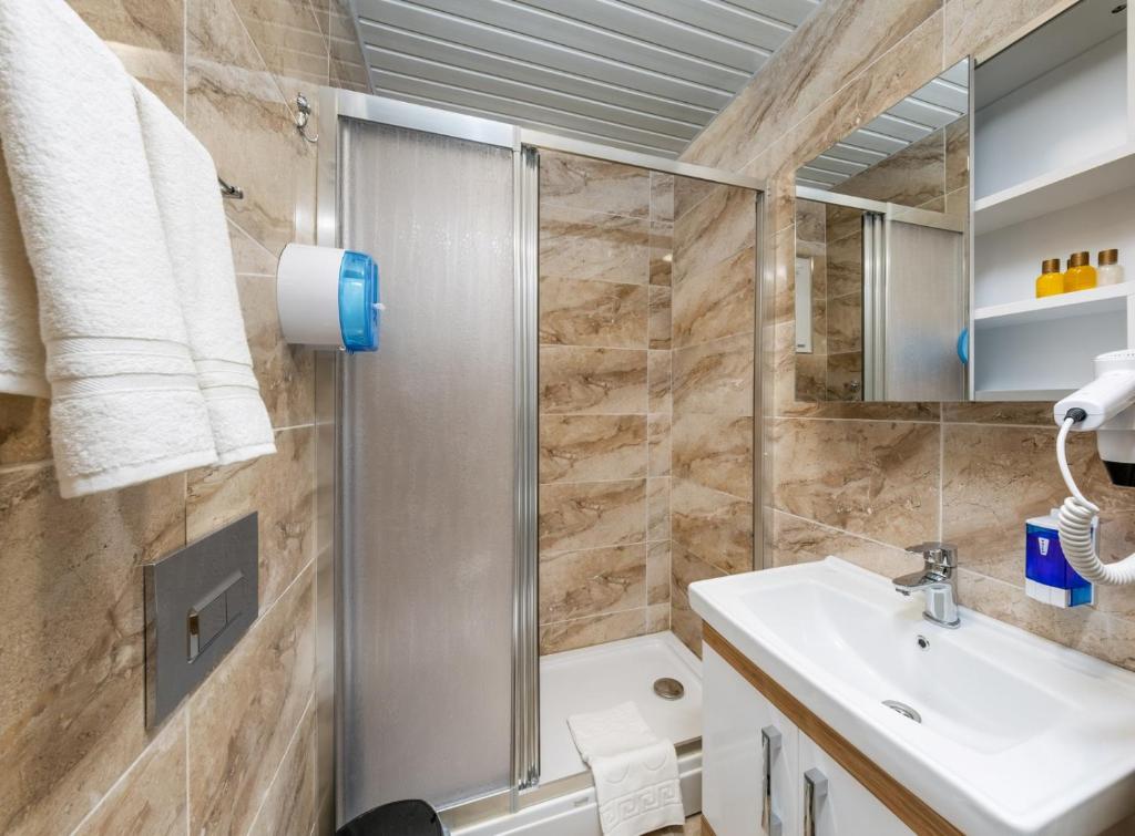 Koupelna v ubytování Anelli Hotel