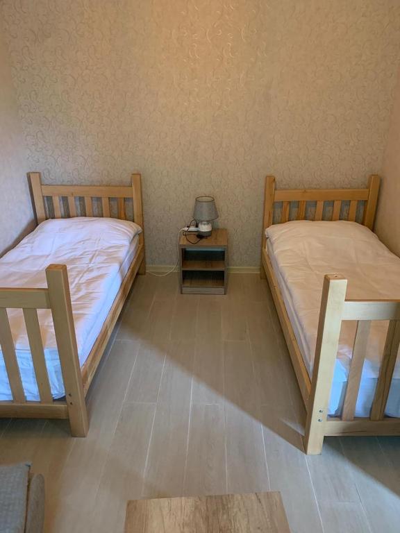 Postel nebo postele na pokoji v ubytování Hotel SHIBI