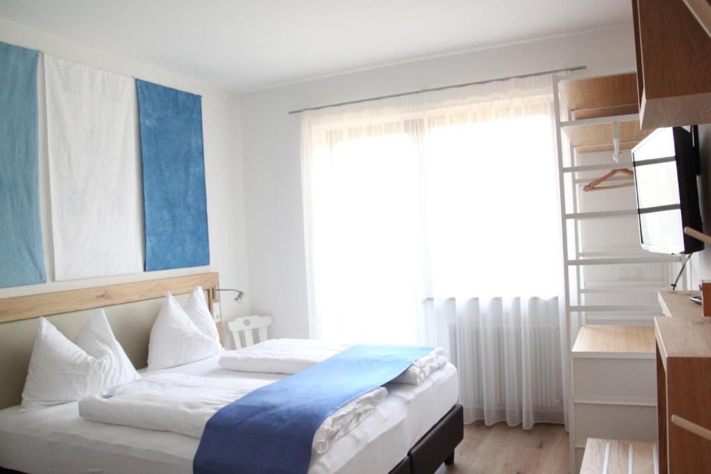 Postel nebo postele na pokoji v ubytování Residence die Färbe