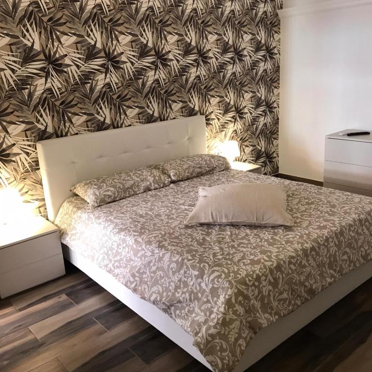 Postel nebo postele na pokoji v ubytování Exclusive Rooms