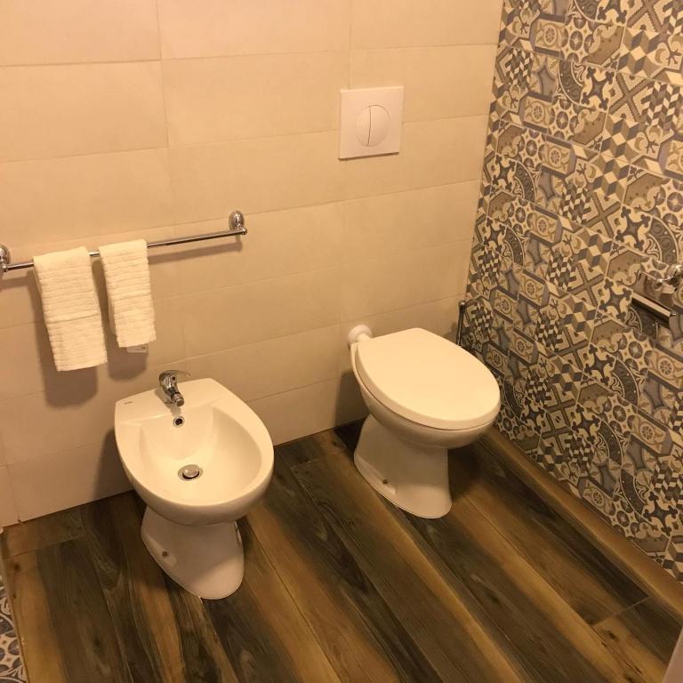 Koupelna v ubytování Exclusive Rooms