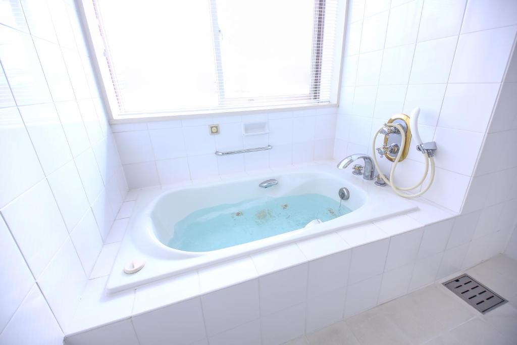 Koupelna v ubytování Hotel Marital Sousei Kurume