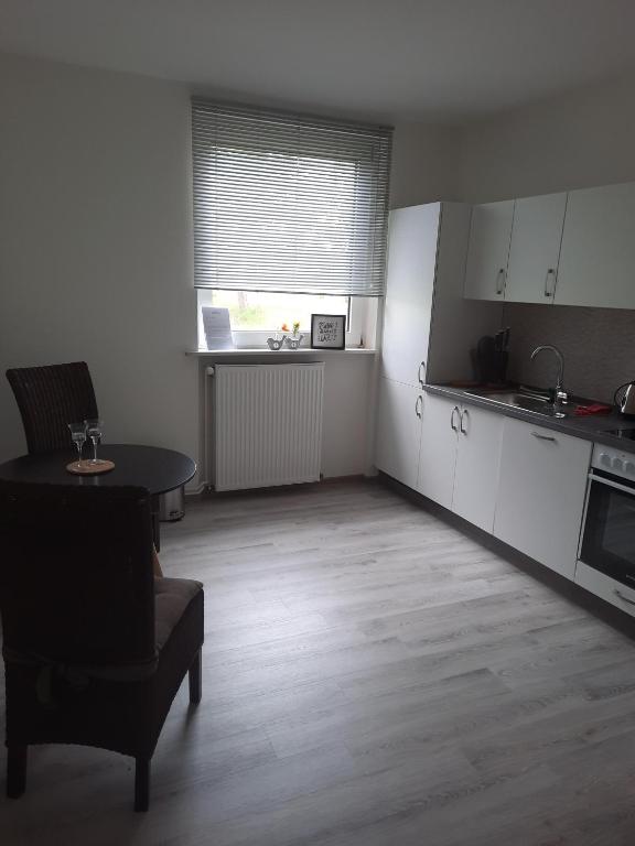 Kuchyň nebo kuchyňský kout v ubytování Hotel Zur Erholung & Restaurant Amme's Landhaus
