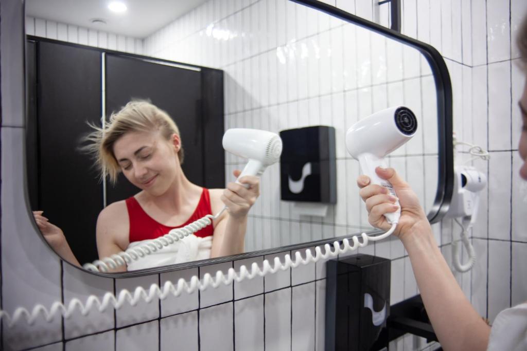 Hosté ubytování AV-1 Capsule Hotel